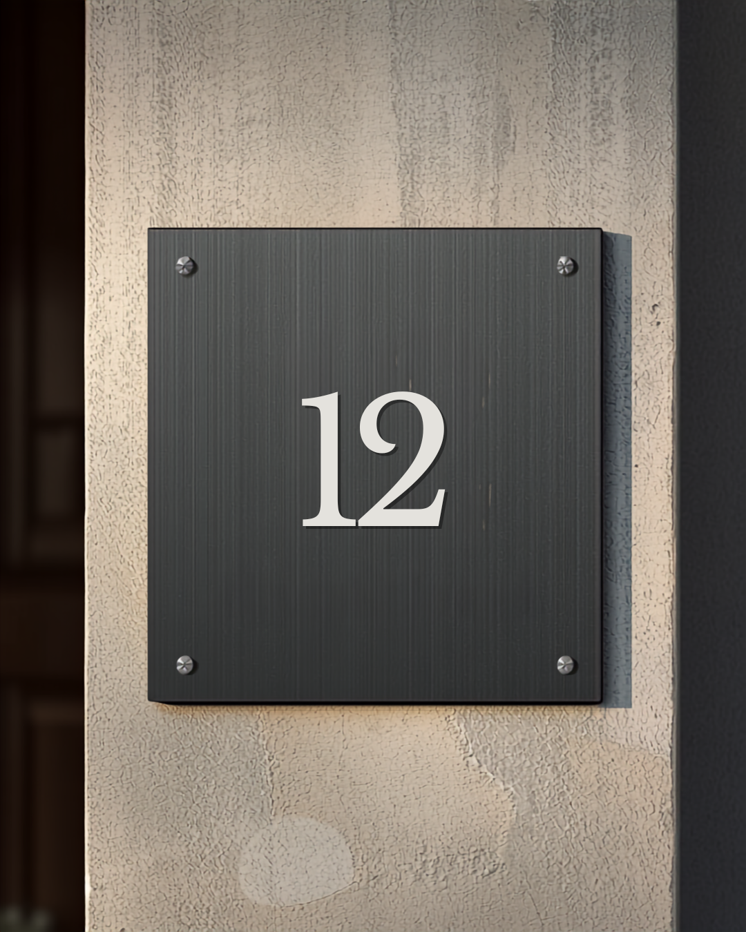 Plaque numéro de maison personnalisée sur une façade